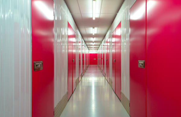 Image of locked self storage units on corridors at a facility