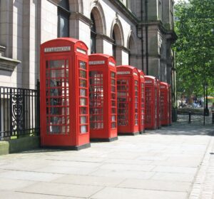 Row of red telephone boxes in Preston