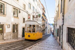 Lisbon street with a yellow tram